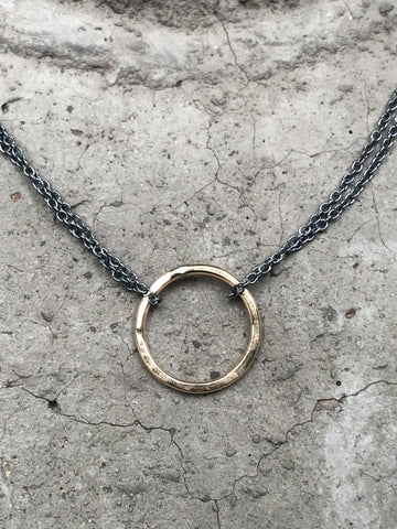 Gold Circle on Tarnished Chain