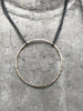 Gold Circle on Tarnished Chain